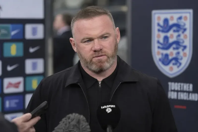 Wayne Rooney avfärdar Andy Carrolls uppgifter